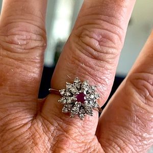 14kt white gold 1carat diamond cocktail ring with a Ruby in the center